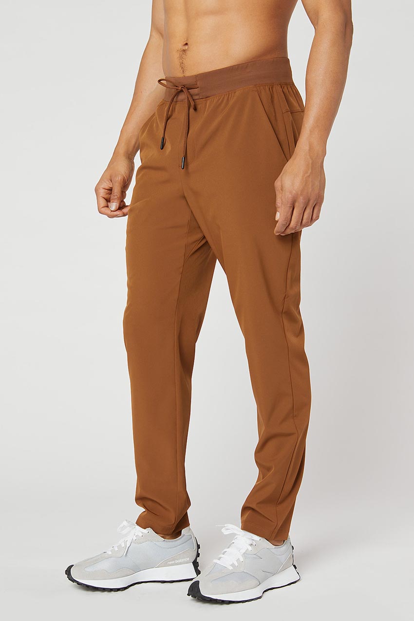 MPG Sport Lithe Recycled Polyester Stretch Woven Pant  in Caramel