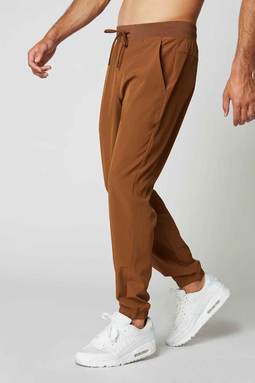 MPG Sport Lithe Recycled Polyester Stretch Woven Jogger  in Caramel